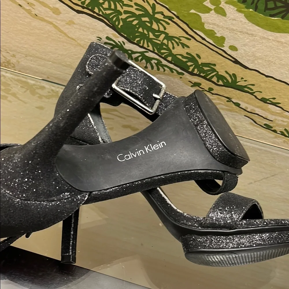 Calvin Klein Sleek Black Stiletto Heels with Ankle Strap